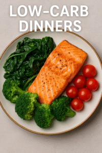 Low-Carb Dinners plate with grilled salmon, broccoli, spinach, and cherry tomatoes